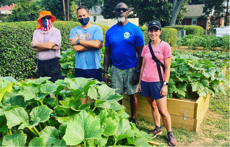 plentiful plants in garden with IoT solution, Ali Hosseini second to left